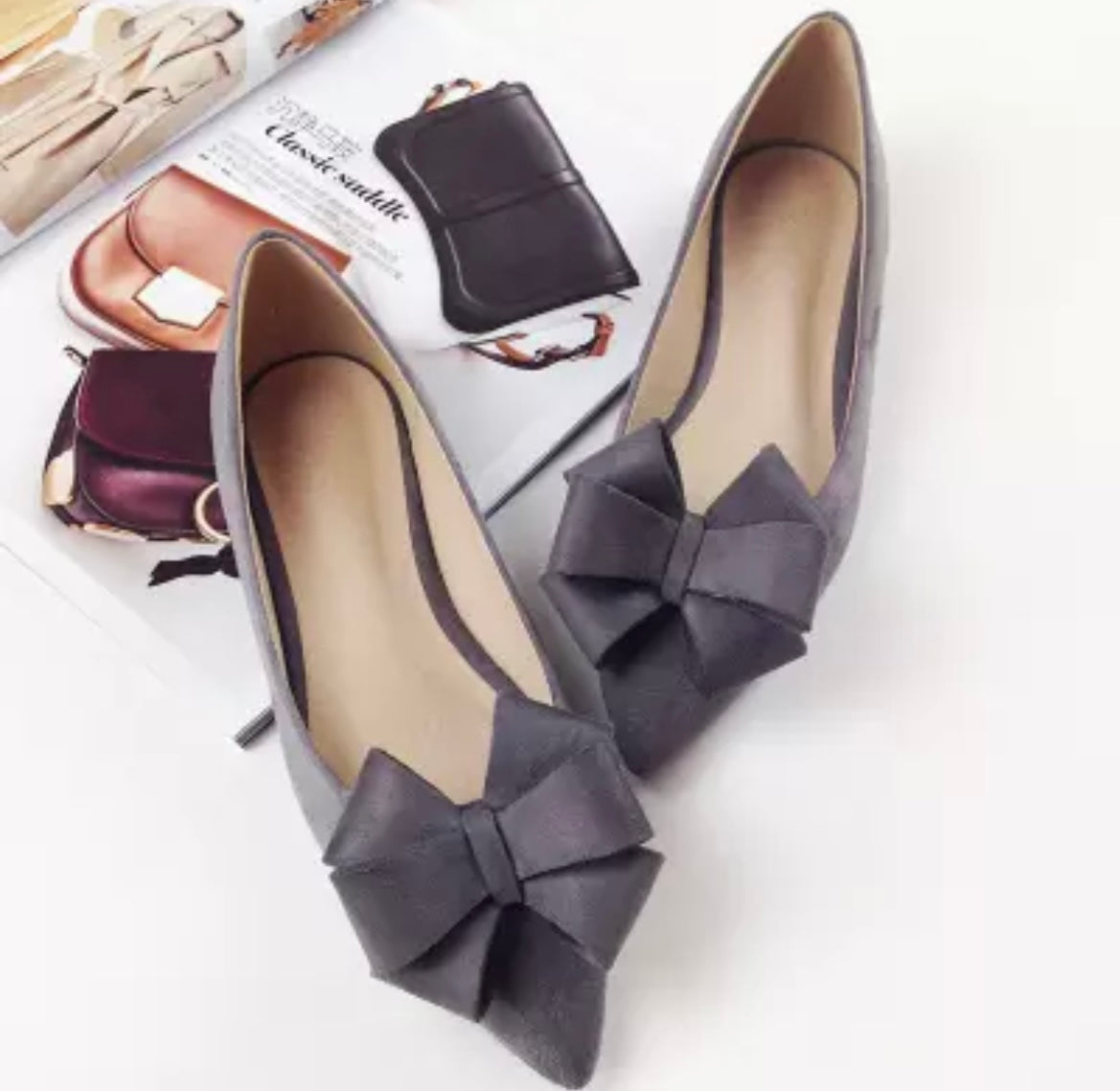 Grey Bow flat pumps