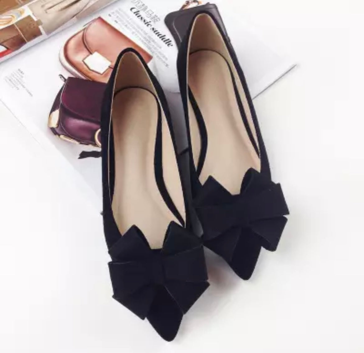 Black Bow flat pumps