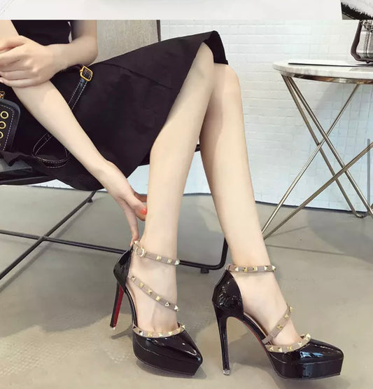 Black platform high heeled ladies shoes with rivet straps and red soles