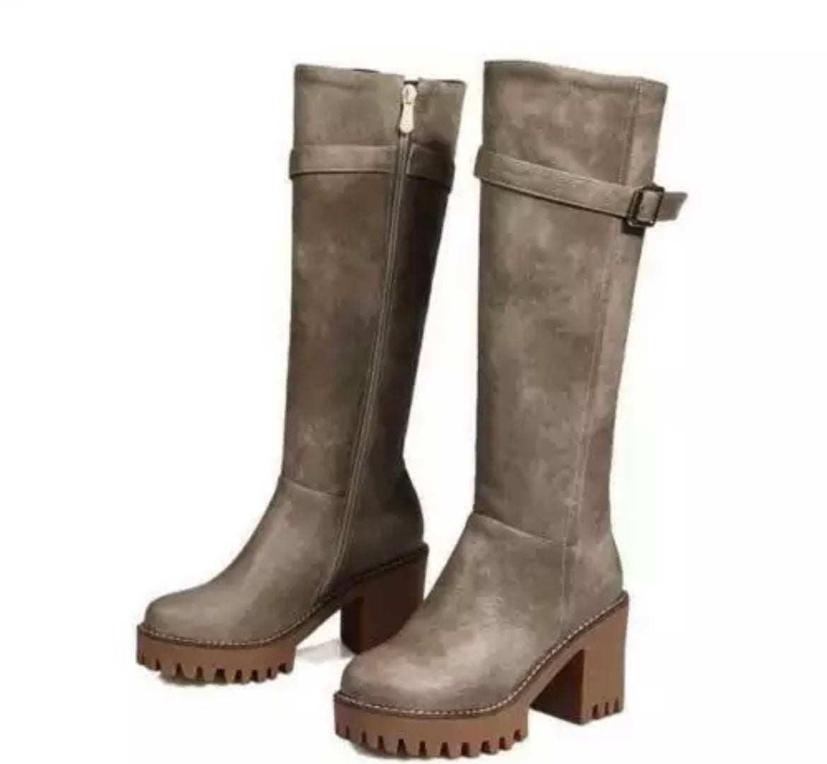 Grey Knee high leather boots with grooved track sole
