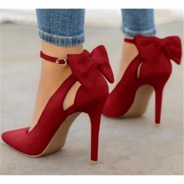 red high heeled court shoe with bow on back